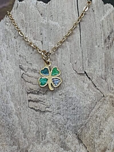 #1017-2 - pendentif mini trèfle à 4 feuilles en inox doré