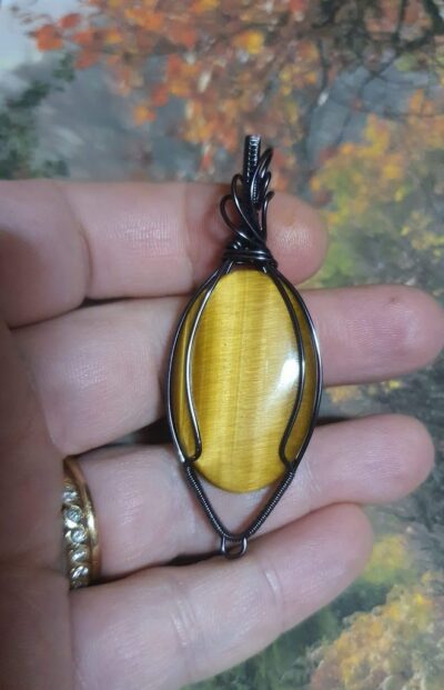pendentif en œil de tigre couleur miel