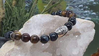 Bracelet élastique pour homme avec des perles d'œil de tigre, taureau et faucon avec sa perle inox gravée d'un loup
